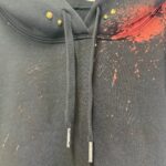 スタッズ×ペイント デザイン プルオーバーパーカー